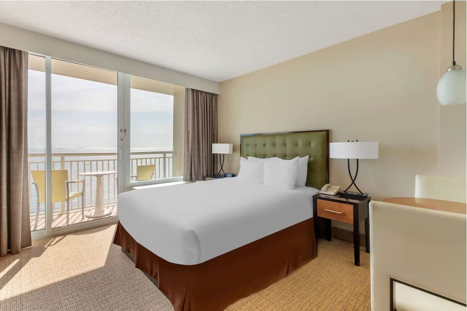 Breathe in ocean breezes from your private balcony retreat.