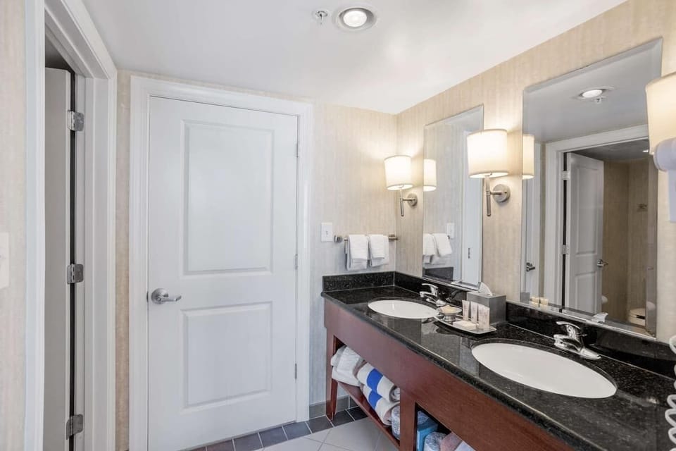 Refresh at the double vanity with bright, flattering lighting.