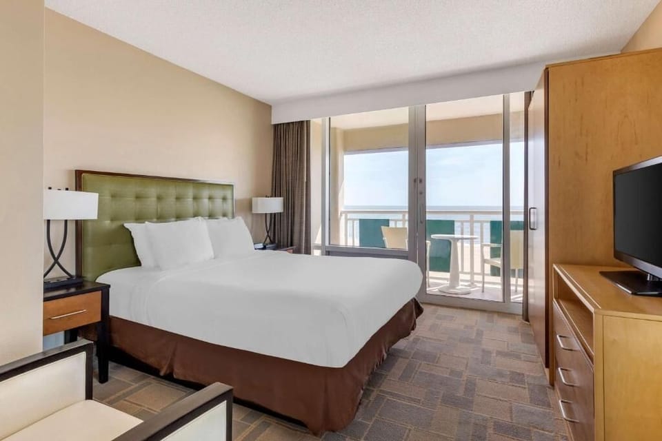 Wake up to ocean breezes from your private balcony retreat.