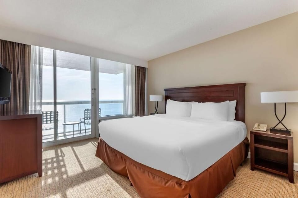 Wake up refreshed to sunlit bedroom and ocean balcony views