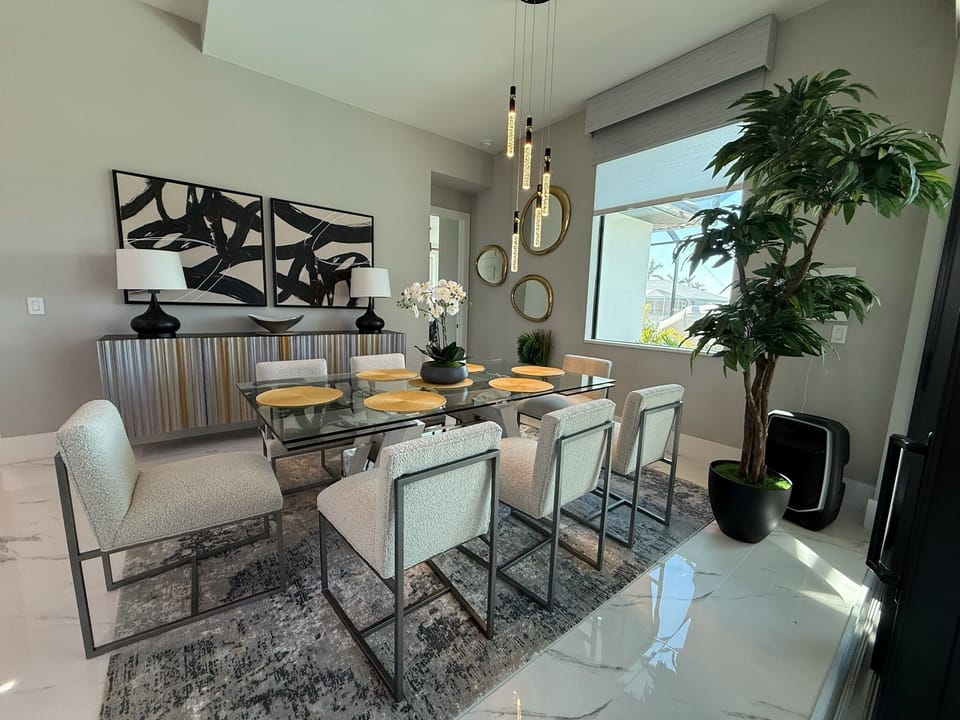 Glass dining table with room for eight people. 