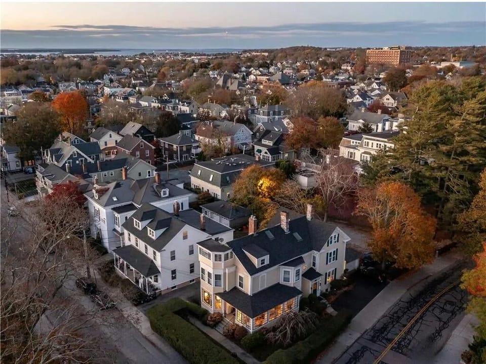 On the corner of Mann & Kay St, aerial view of our top floor condo- w/sunporch. 