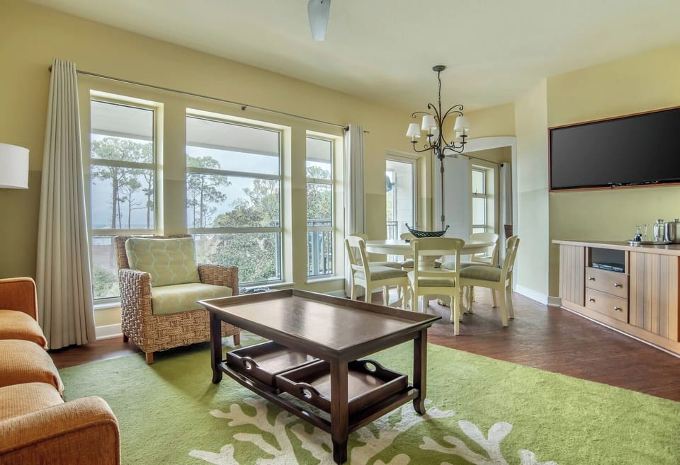 Sip coffee by wide windows and relax with scenic views.