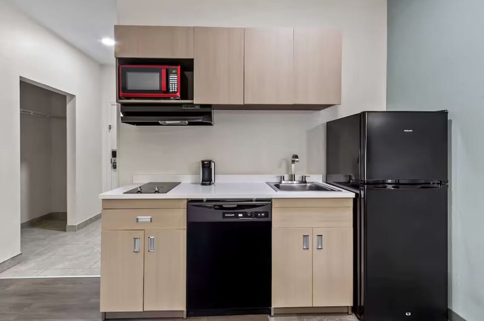 Fuel your day with an easy kitchenette and full fridge.