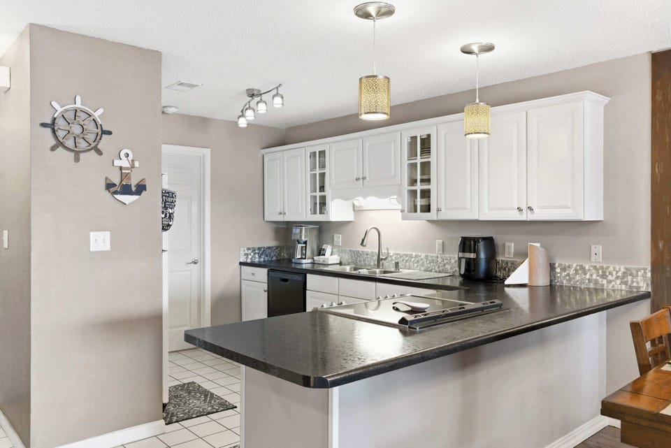 The open kitchen is well equipped for an unforgettable getaway​