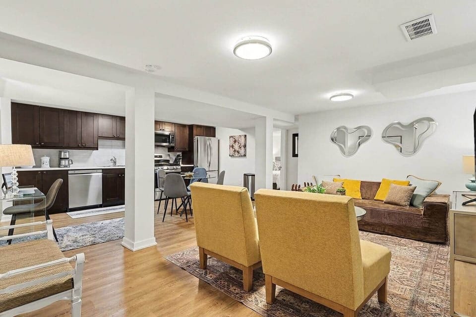 Share a meal or catch up on work at the stylish dining table, perfectly situated between the kitchen and living area in Ottawa.