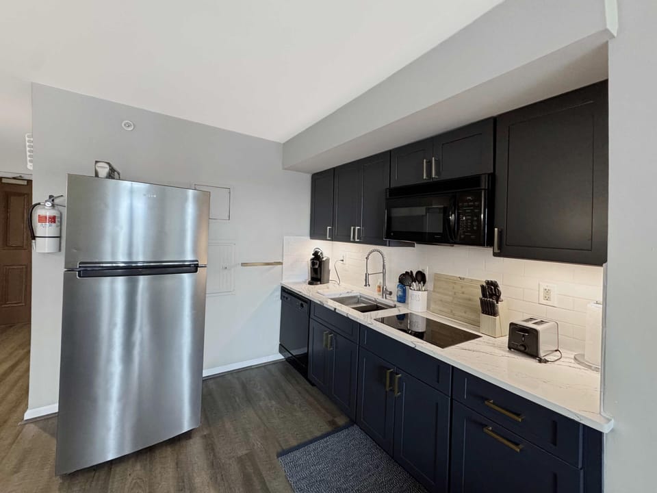Sleek kitchen with modern appliances and ample counter space