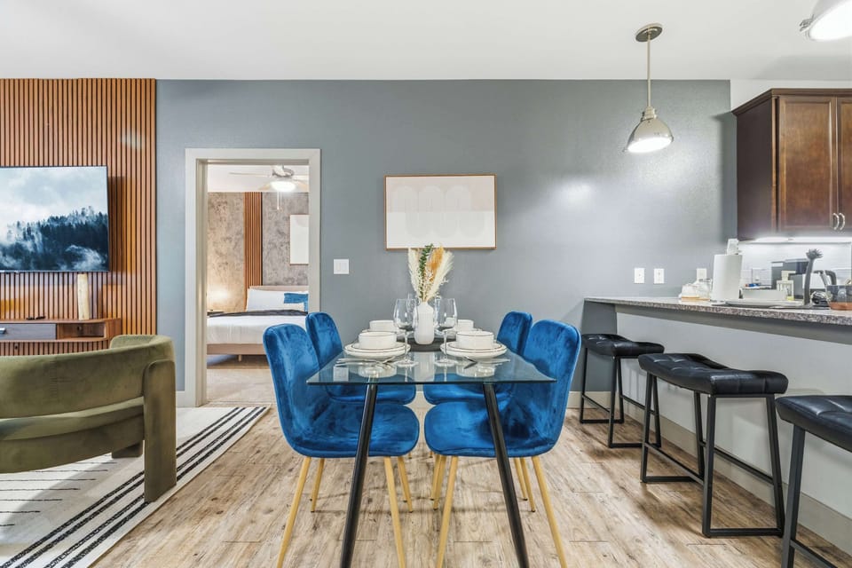 Modern dining nook with seating for four and natural light