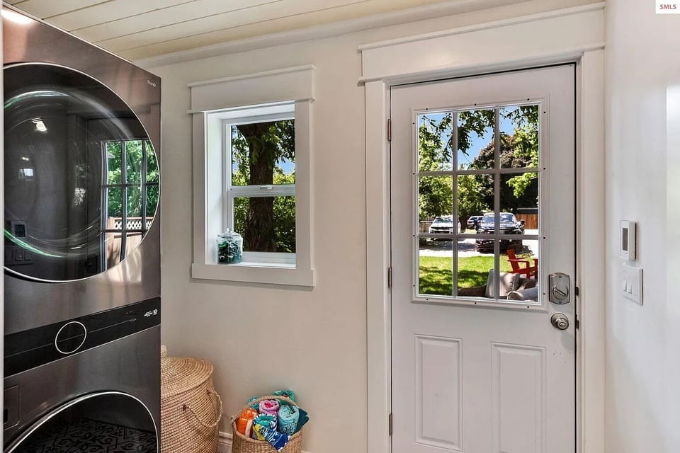 Full laundry access just off kitchen and back porch area