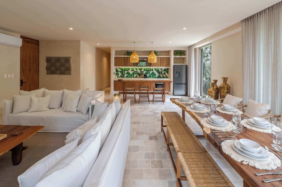 Gather around the table and enjoy meals in a bright, open setting.