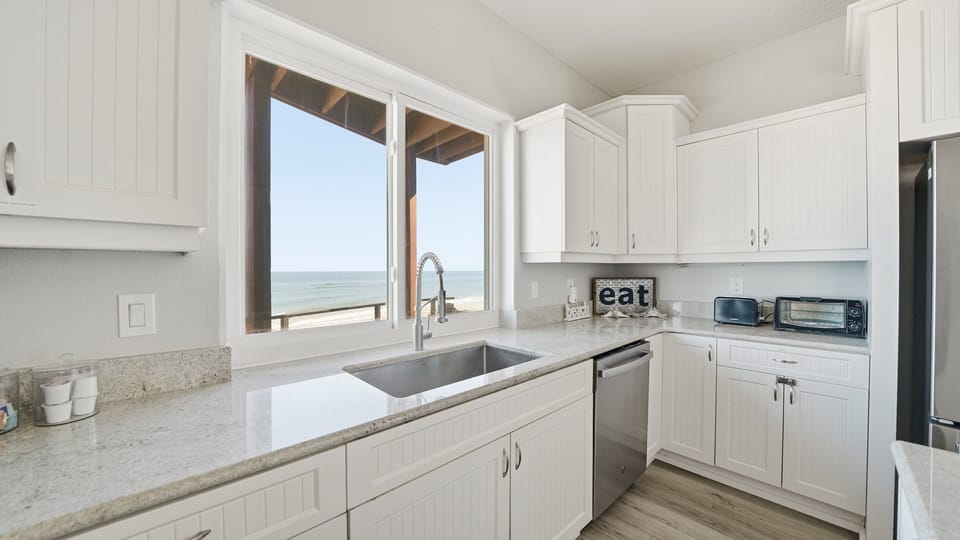 The kitchen is equipped with essentials for simple meal prep and everyday convenience.
