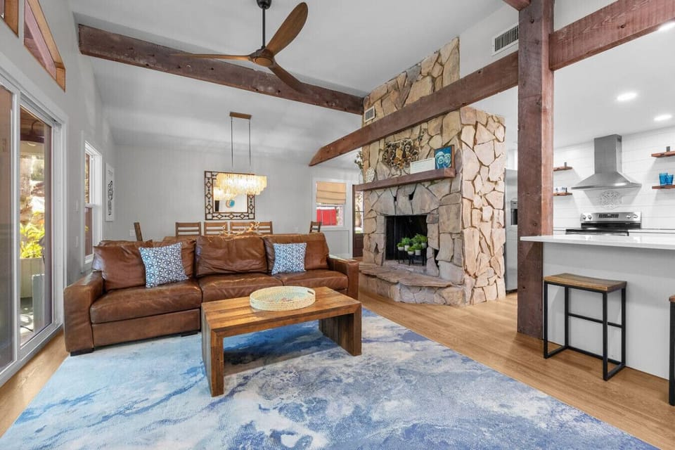 Open, welcoming, and easy to enjoy  The living room connects seamlessly to the kitchen and dining area, keeping the whole home feeling bright and connected.