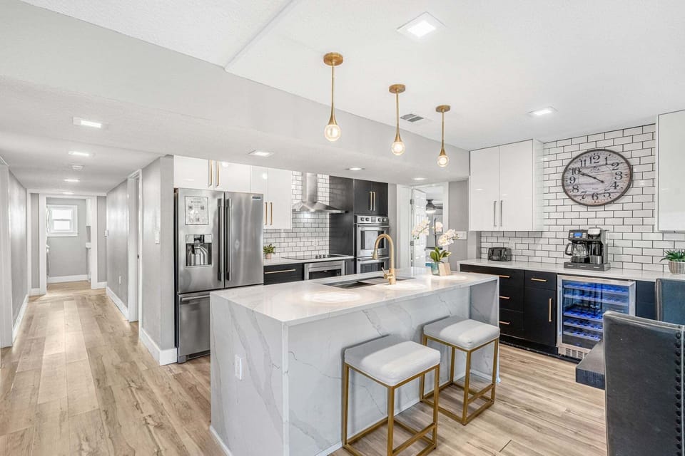 Drink your morning cup of coffee at the breakfast bar that seats three