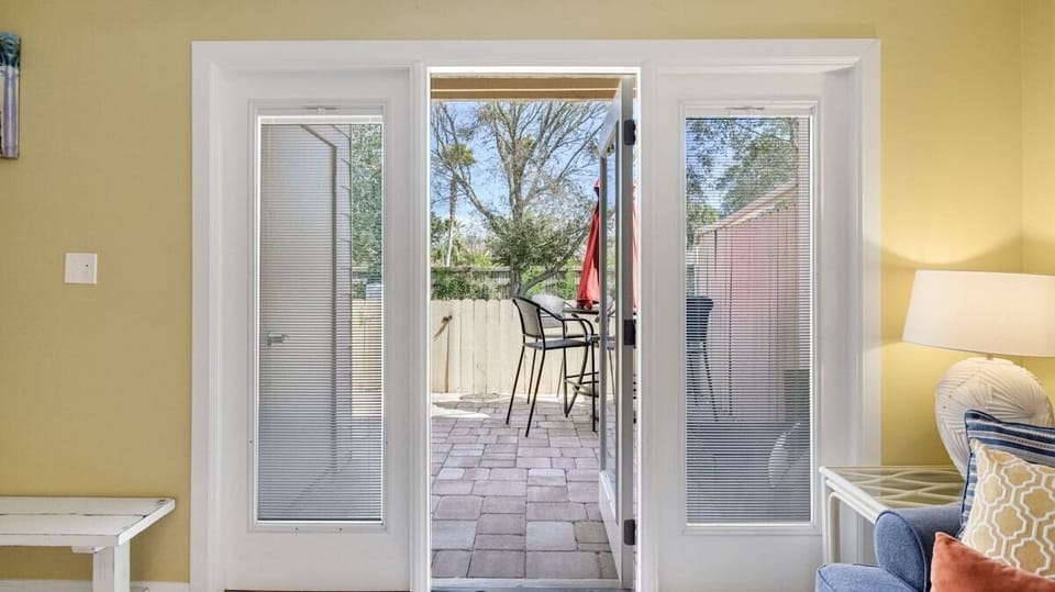 Enjoy the fresh air on the cozy back porch