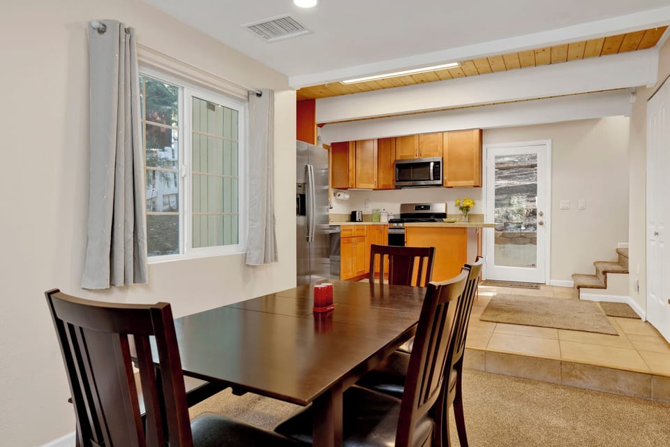 Inviting dining area designed for comfort and connection. The space feels open and airy, with a warm atmosphere that makes everyday meals and special gatherings equally enjoyable.