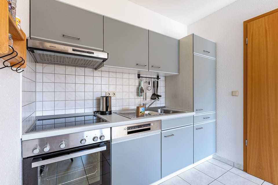 Modern Kitchen with Stove and Cabinets