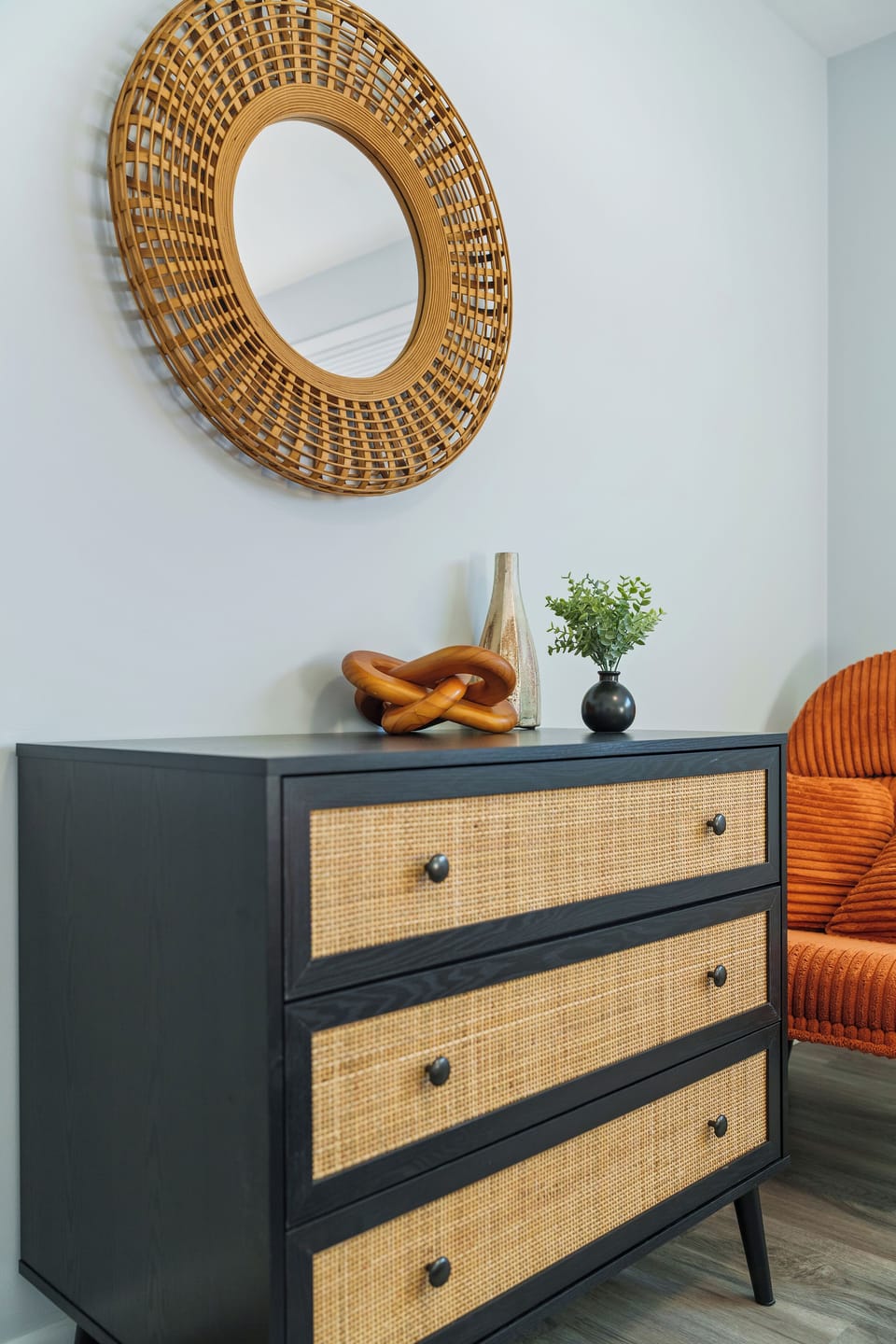 Warm neutrals, layered textures, and subtle lodge-inspired details create a space that feels calm the moment you walk in.
