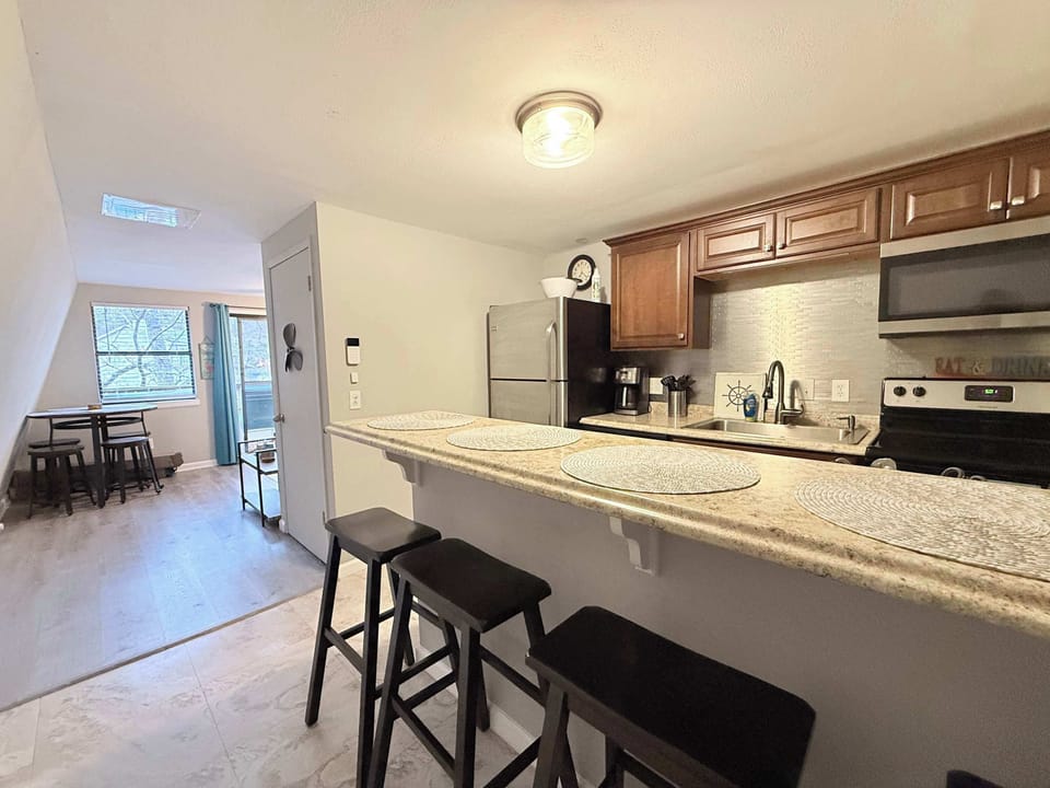 The cozy kitchen is well equipped for an unforgettable getaway​