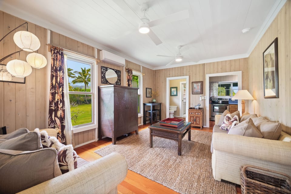 The inviting living room is cozy and homey