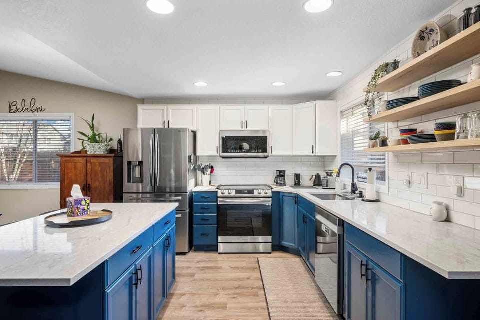 Well-appointed kitchen equipped for everyday cooking, featuring modern appliances and ample prep space.