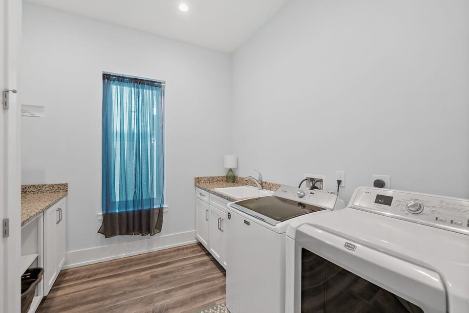 Laundry room with full-size washer and dryer available for guests