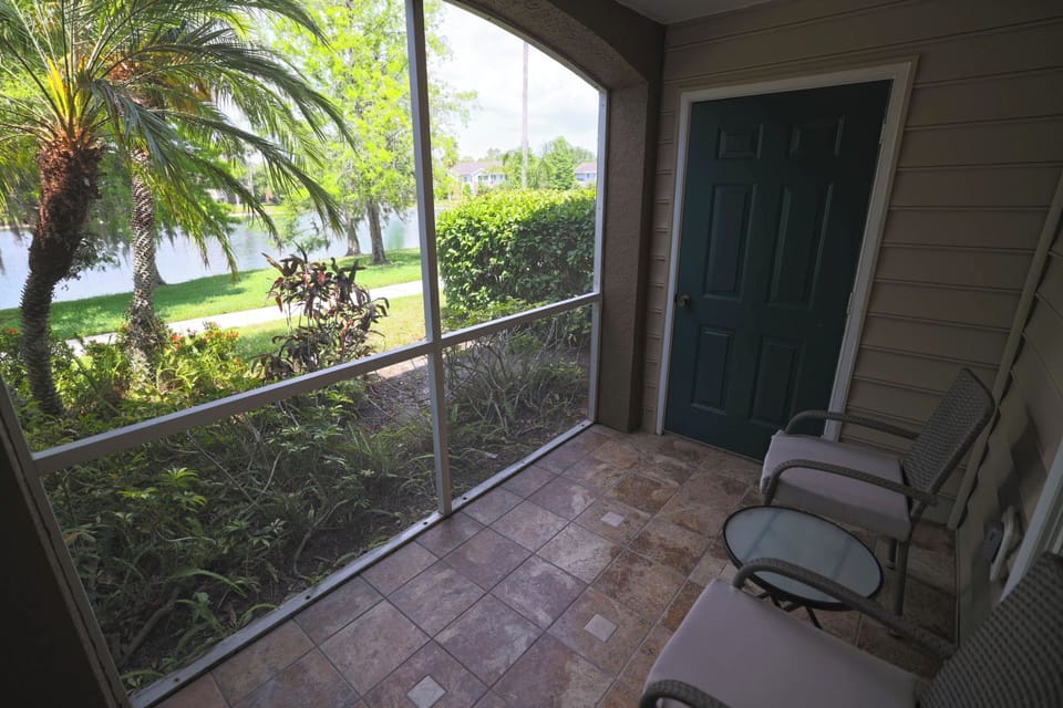 Lanai with view of pond