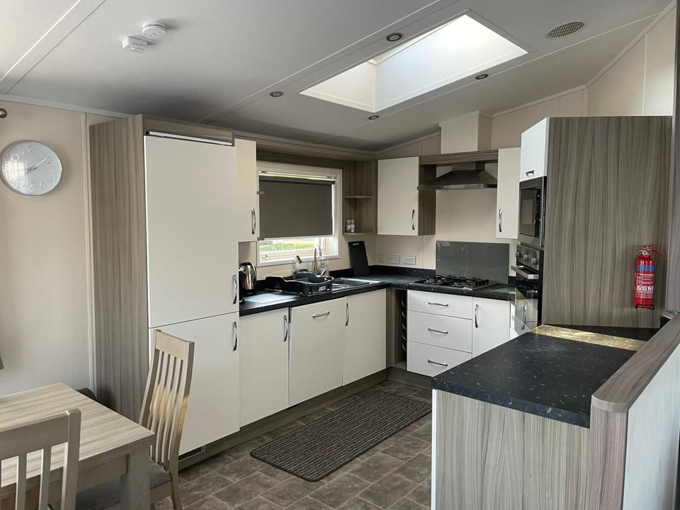 The open plan kitchen and diner is perfect for getting together for a meal followed by a night of games. What will you play first.
