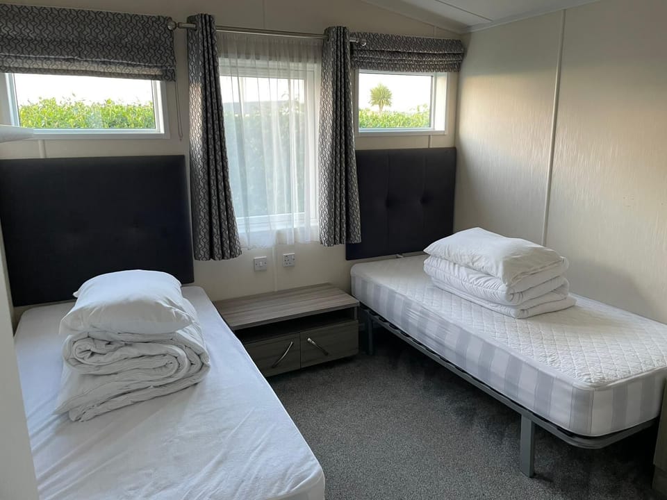 The twin room is perfect for the kids to unpack and make their own. They will love having their own space to relax in and you will sleep well knowing they are tucked up safe next door.