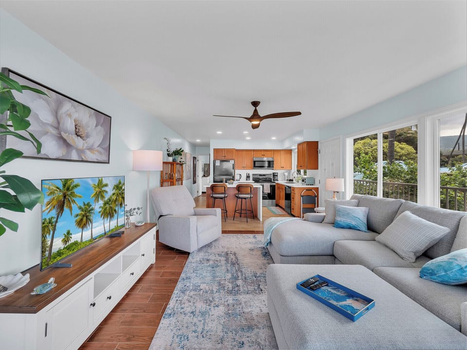 Beautifully updated with new sectional, chaise lounge,  ottoman for extra guests