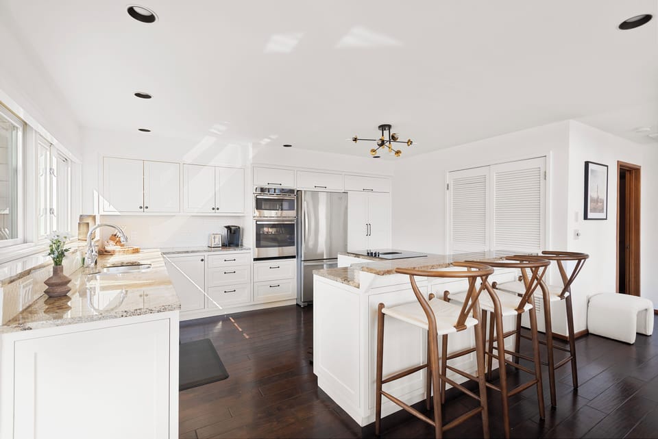 Beautiful kitchen with new stainless steel appliances and views of the valley beyond.