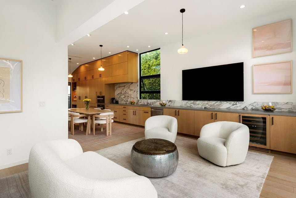 Modern, stylish living space perfect for relaxing or entertaining with floor-to-ceiling pocket doors.