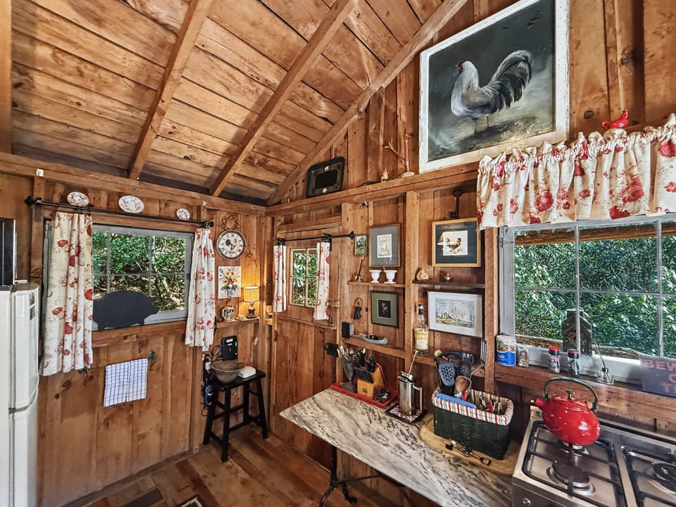 Main floor- kitchen with access door to back deck