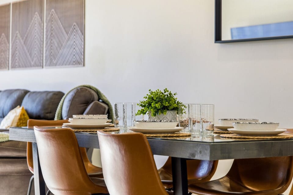 Dining Area: Gather around this stylish table for memorable meals and delightful conversations!