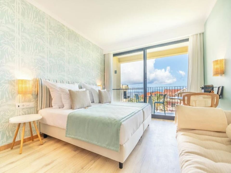 Wake up to ocean breezes and a private balcony view.