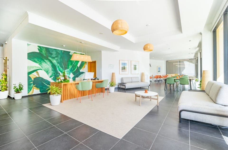 Recharge in a serene lounge with plenty of space to spread out.