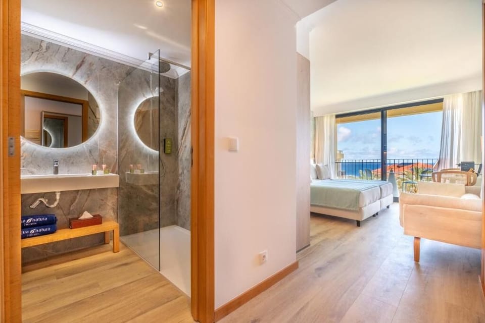 Refresh in a sleek rain shower after beach days.