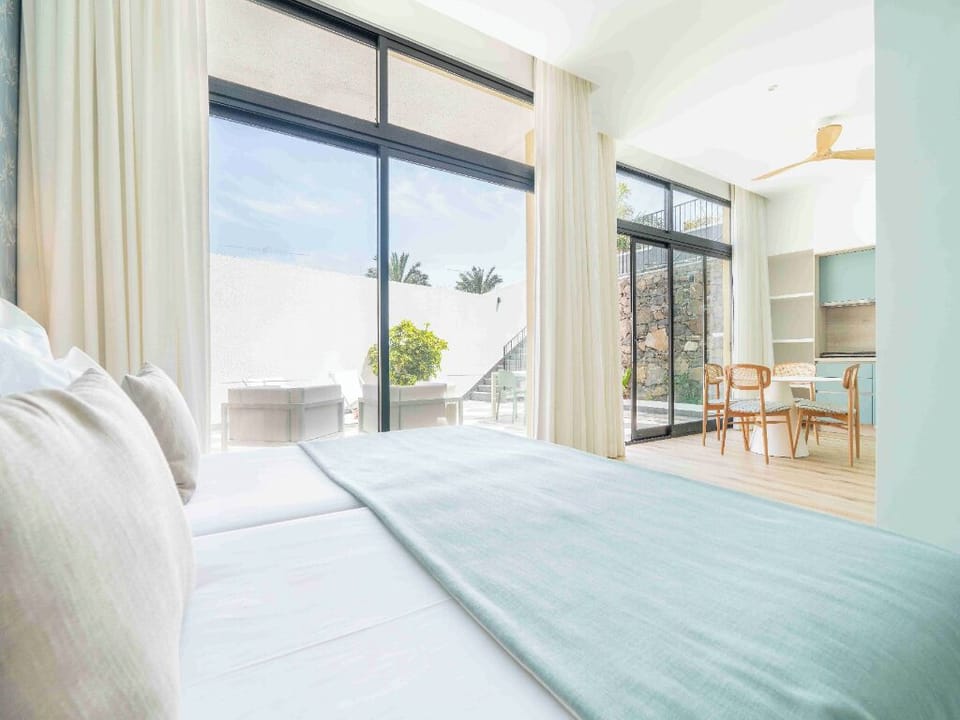 Step outside to a sunlit patio for lazy afternoon lounging.