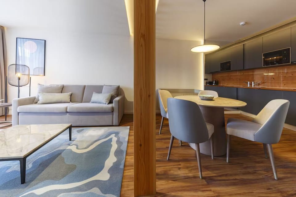 Gather for easy meals at the cozy, designer dining table.