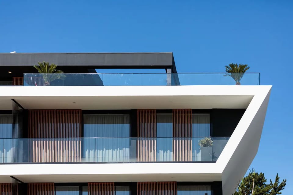 Step outside to striking modern architecture with glass balconies.