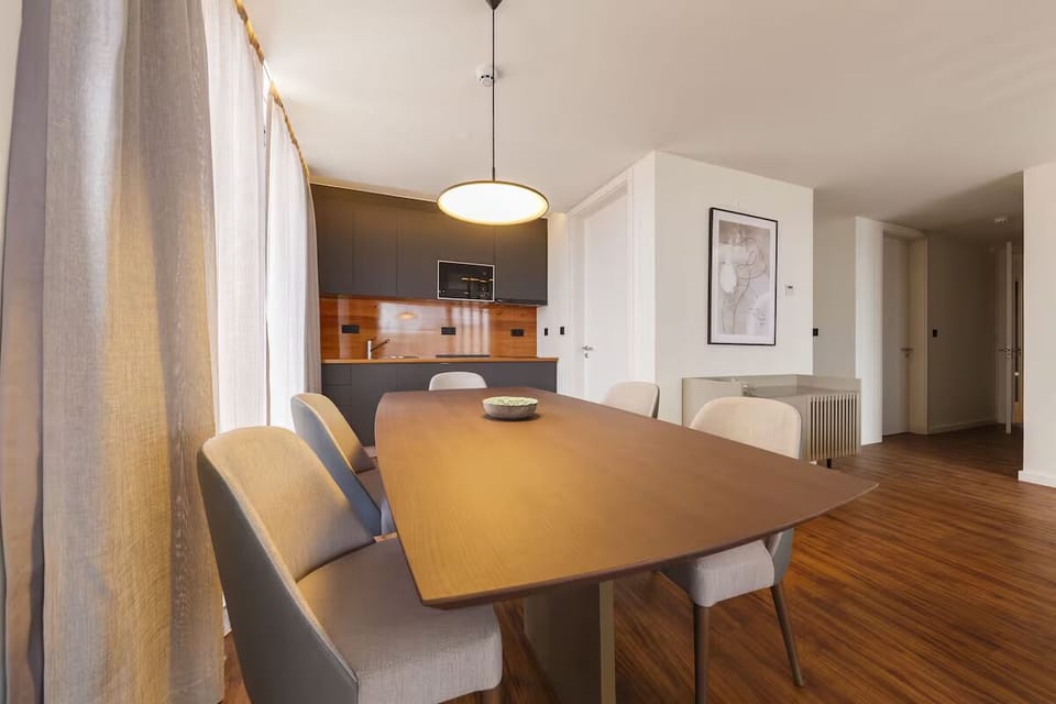 Gather for long dinners around a table made for memories.