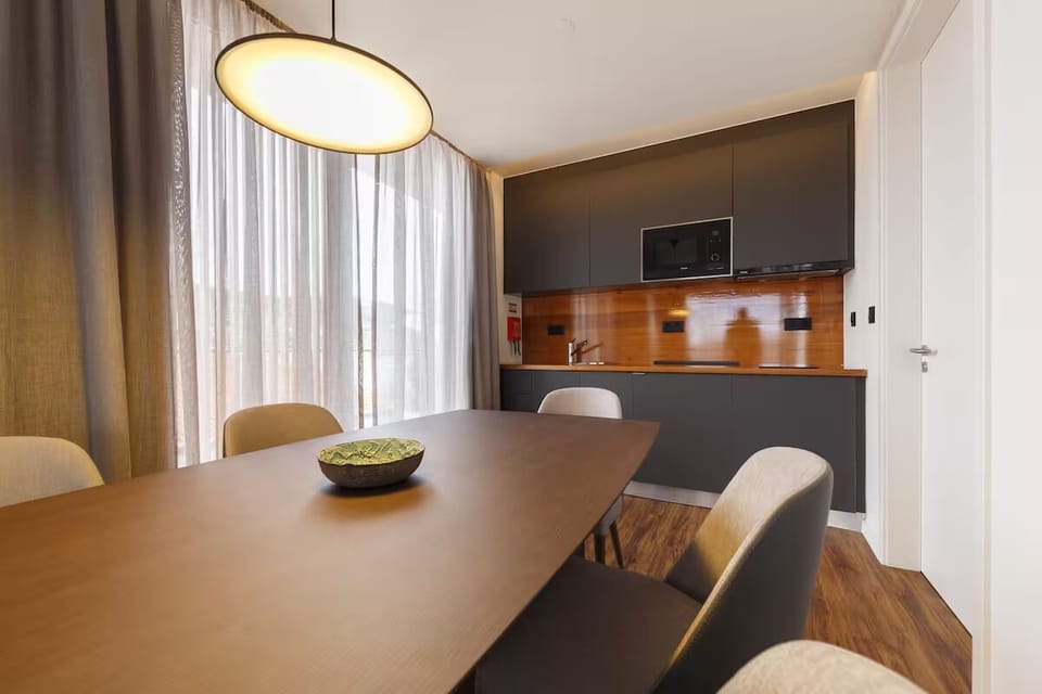 Cook and snack with ease in a stylish, modern kitchenette.