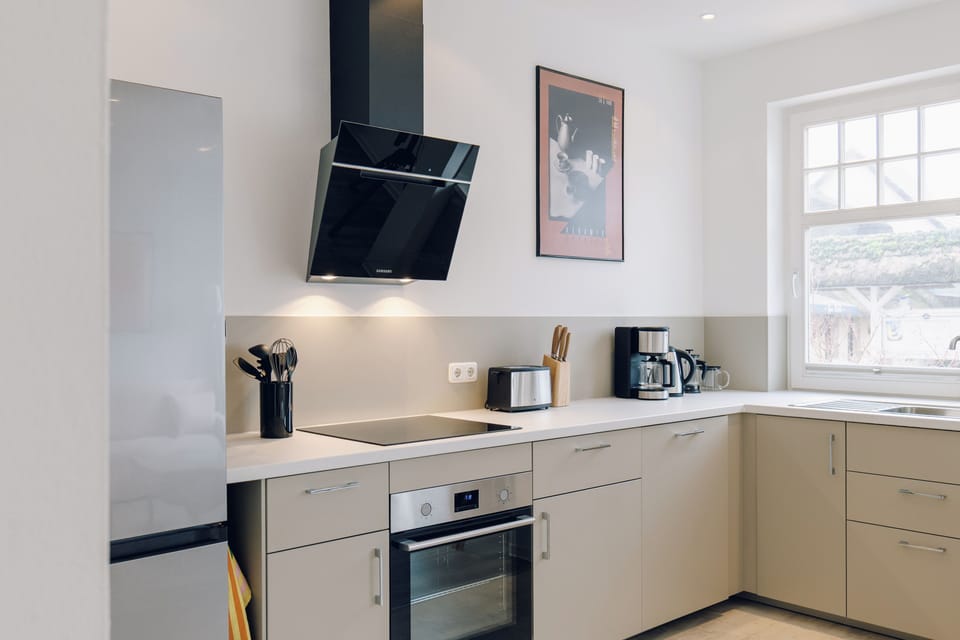 Modern Kitchen with Cooktop and Refrigerator