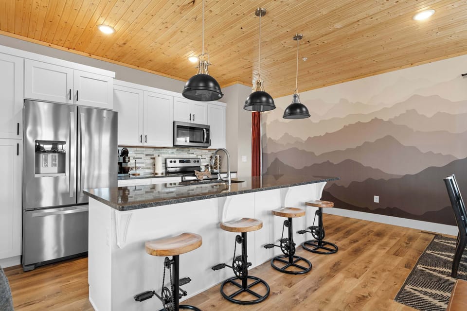The open kitchen offers ample space & all the comforts of home​