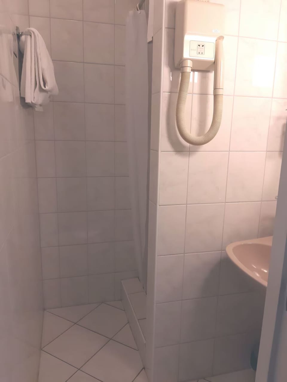 Refresh after a long day in a simple walk-in shower.
