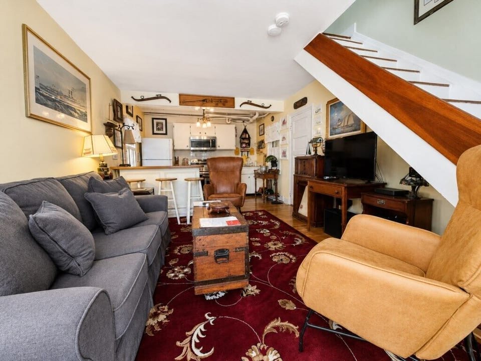 The open main level blends kitchen and living areas in this character-filled Annapolis home.