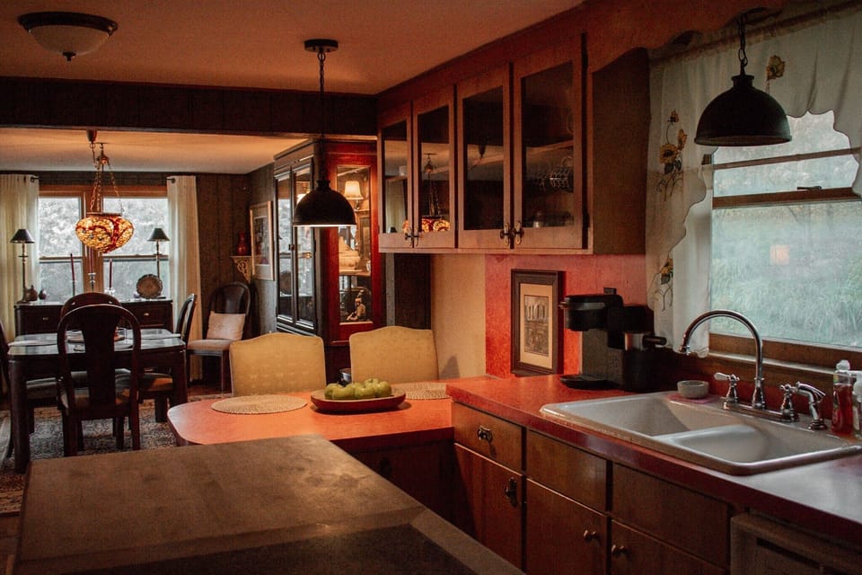 Kitchen to dining room. Enjoy the older kitchen. 