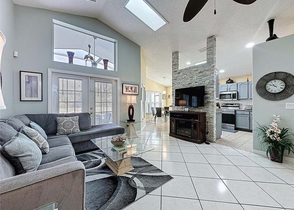 Living room + Fireplace + Kitchen + Kitchenette