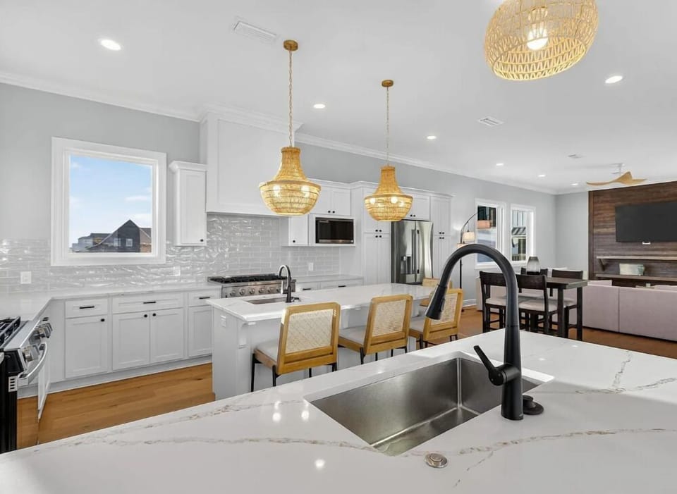 Pull up a seat — the kitchen island was made for morning coffee, quick bites, and good conversation