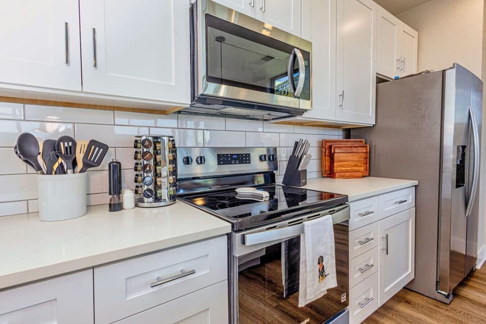 Kitchen Delight: Modern appliances, sleek countertops, and all the tools for culinary adventures!