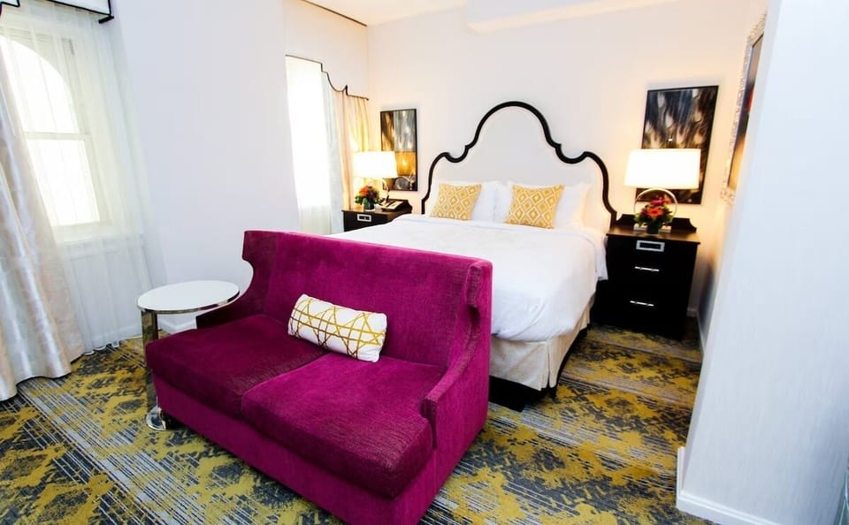 Stretch out and settle in with luxe linens and warm lighting.